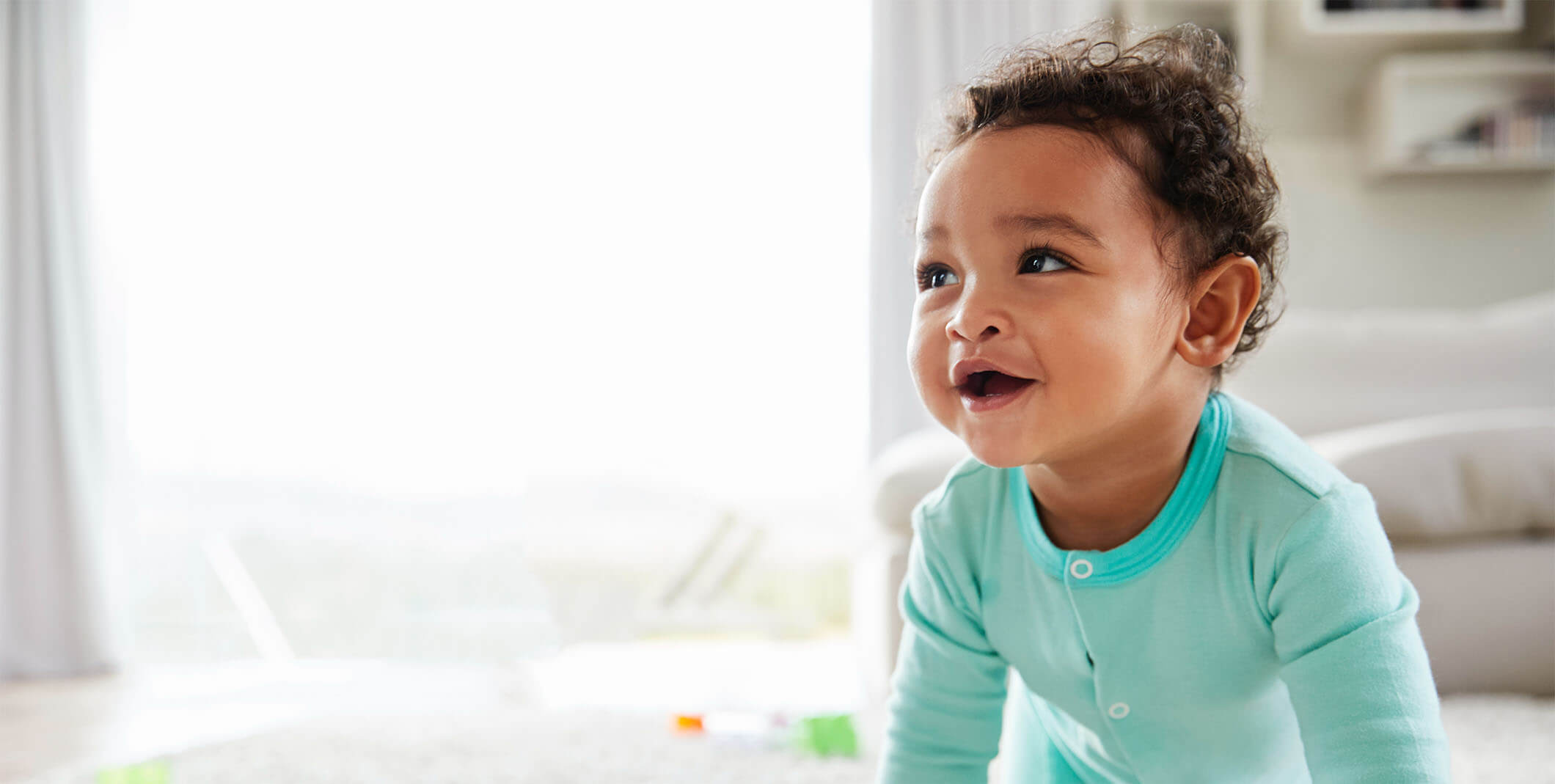 young baby laughing