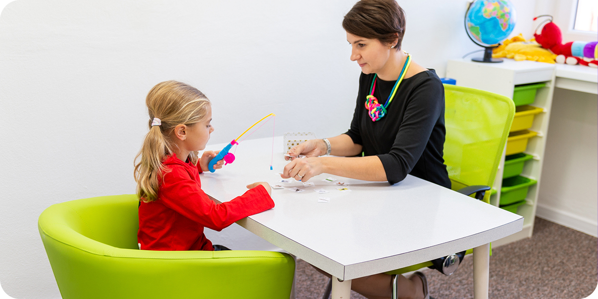 speech therapist with child