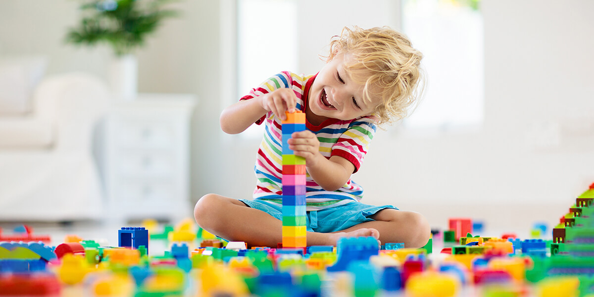 child playing with blocks