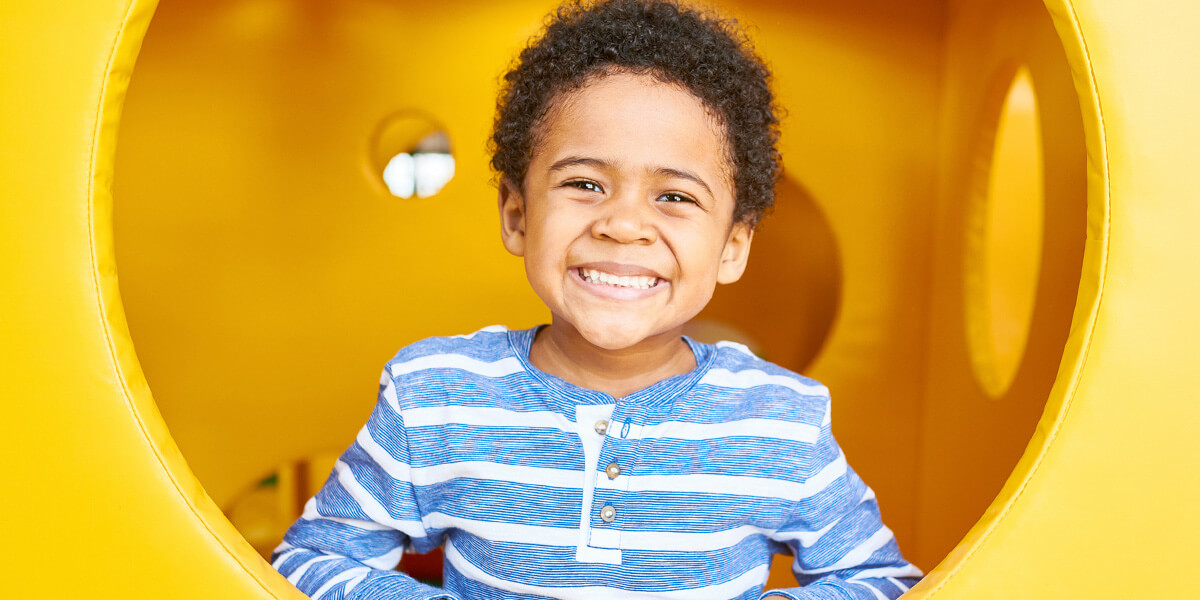 Child smiling on playground